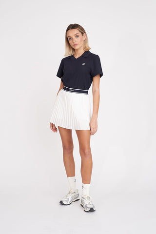 BIRDIE PLEATED GOLF SKORT CHALK/NAVY